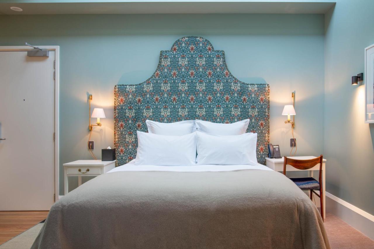 The Observatory Hotel Christchurch Kültér fotó A bedroom at the hotel