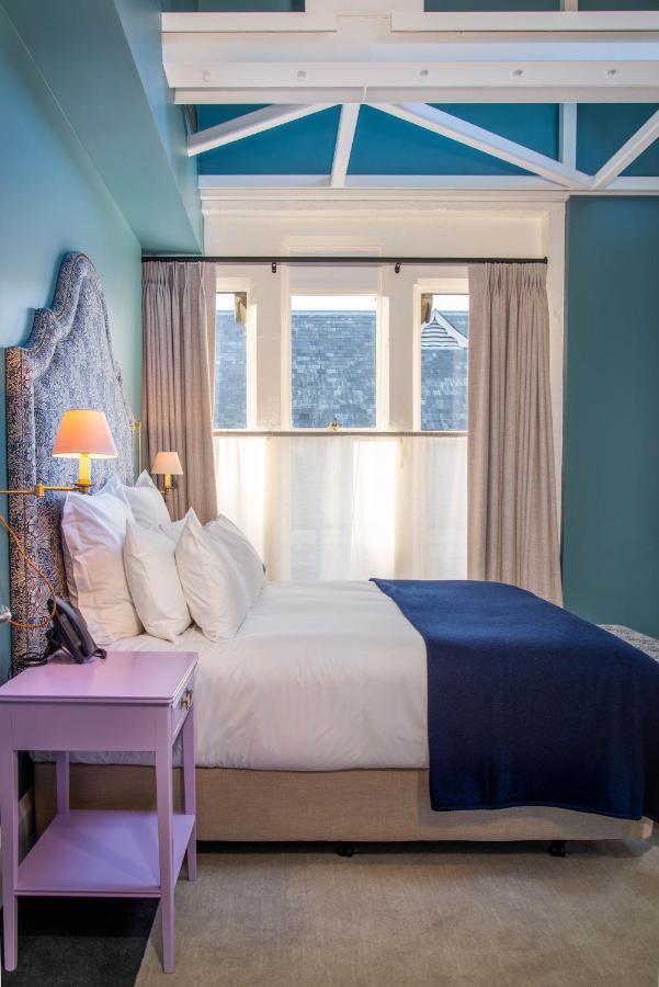 The Observatory Hotel Christchurch Kültér fotó A bedroom at the hotel