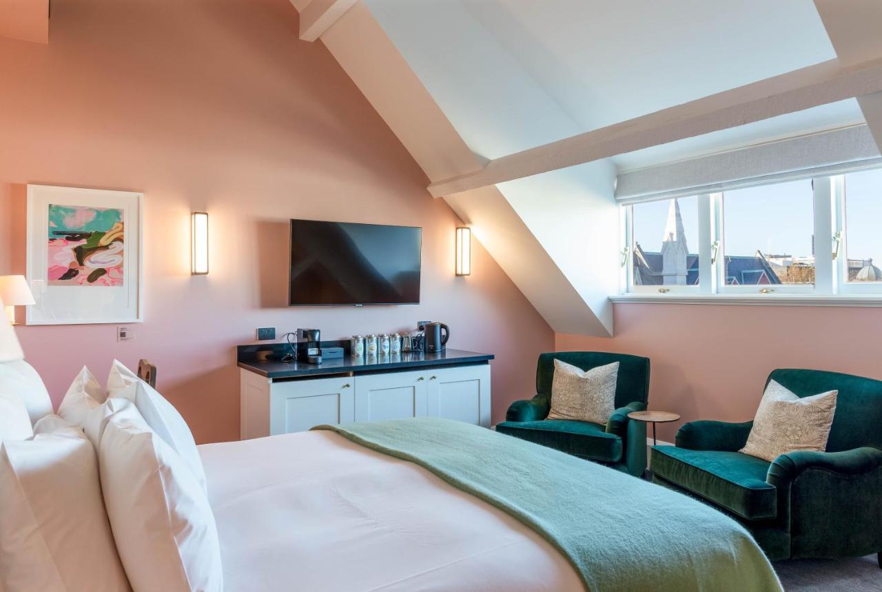 The Observatory Hotel Christchurch Kültér fotó A bedroom at The Ivy Collection